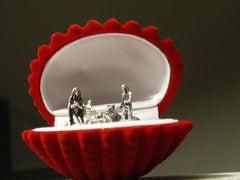 Muschel mit Zinnfiguren